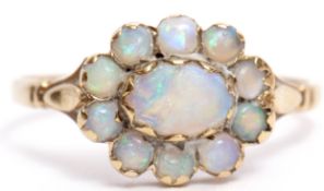 9ct gold and opal cluster ring, an oval design with central large opal within a surround of 10 small