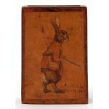 Early 20th century treen matchbox holder, the front painted with an image of a gamekeeper rabbit