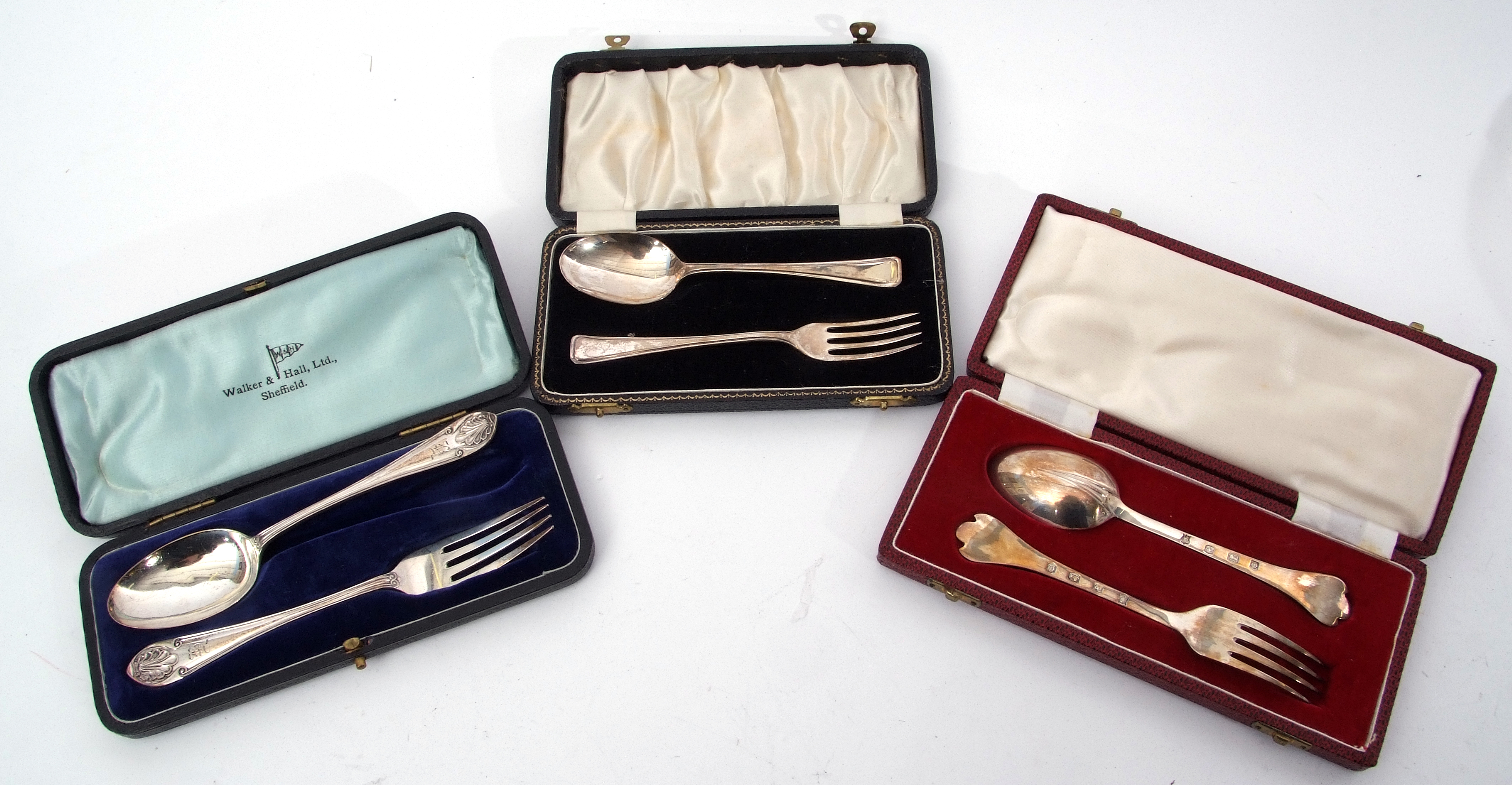 Mixed Lot: cased pair of Elizabeth II christening fork and spoon in trefid pattern, Sheffield 1956