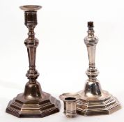 Pair of late Victorian silver encased candlesticks in George I style, having octagonal stepped and