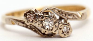 18ct diamond three stone cross over ring featuring 3 graduated small diamonds, each in illusion