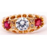 Late 19th century 18ct gold, ruby and paste set ring, the centre white stone between two small