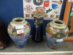 PAIR OF ROYAL DOULTON STONEWARE BERRY DECORATED VASES TOGETHER WITH ONE SIMILAR (A/F) (3)