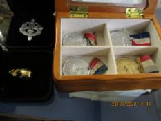 BEECHWOOD JEWELLERY BOX CONTAINING FOUR MEDALS