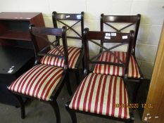 SET OF FOUR REPRODUCTION MAHOGANY REGENCY DINING CHAIRS WITH X-FRAME BACKS AND SABRE FRONT LEGS WITH