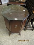 REPRODUCTION MAHOGANY HEXAGONAL TOP SIDE CUPBOARD ON SPLAYED LEGS