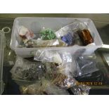 SMALL PLASTIC TUB CONTAINING MIXED BEADS, NECKLACES ETC