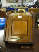 OAK FRAMED COAL BOX WITH PANELLED FRONT WITH BRASS KNOB AND TOP HANDLE