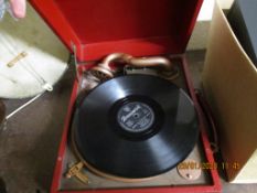 RED REXINE CASED BRUNSWICK PORTABLE RECORD PLAYER