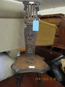 MID-20TH CENTURY OAK FRAMED CARVED HARP SPLAT BACK SPINNER’S CHAIR WITH FOUR TURNED LEGS