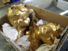 TWO SMALL BOXED RESIN PUTTI