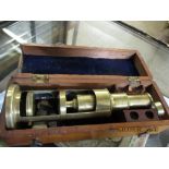 MAHOGANY CASED PART BRASS MICROSCOPE