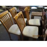 FOUR BEECHWOOD FRAMED CREAM SEATED KITCHEN CHAIRS