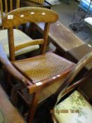 WICKER TOP FOOT STOOL TOGETHER WITH AN ELM HARD SEATED BAR BACK CHAIR