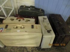 SIX ASSORTED SUITCASES TO INCLUDE A TIN CASE