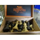BOX CONTAINING TREEN CHESS PIECES