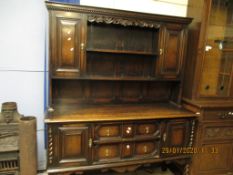 EARLY 20TH CENTURY OAK FRAMED DRESSER, THE TOP FITTED WITH TWO OPEN SHELVES, FLANKED EITHER SIDE