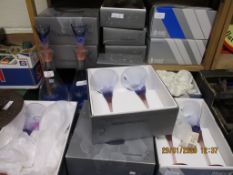 QUANTITY OF BOXED CHRISTINE NHUTTE HAND CRAFTED GLASS DECANTERS, WINE GLASSES, CHAMPAGNE FLUTES ETC