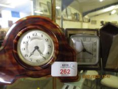 TWO TRAVELLING CLOCKS, ONE IN A PRESENTATION CASE (2)