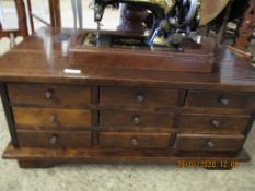 PINE FRAMED BOX COFFEE TABLE WITH NINE DRAWERS WITH BUTTON HANDLES AND LIFT UP TOP