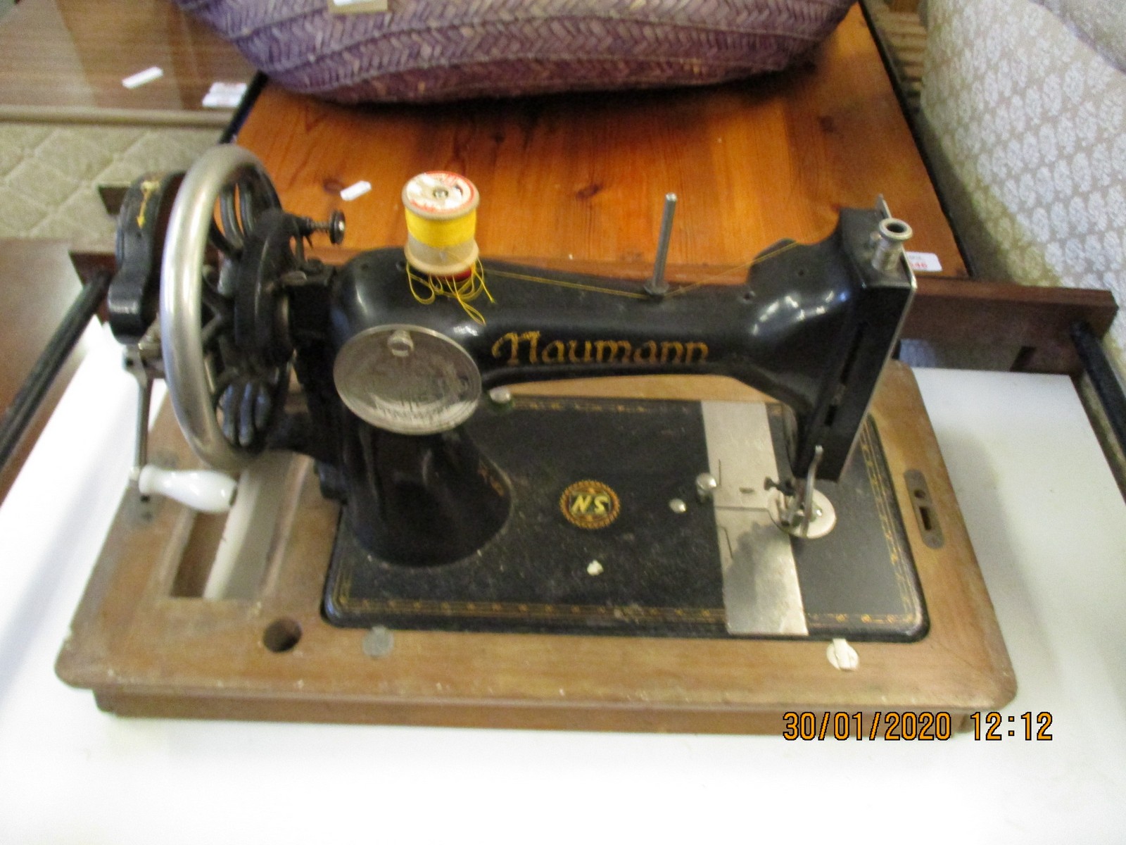 CASED SEWING MACHINE