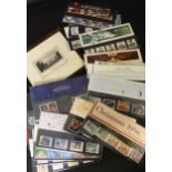 Four crates containing a GB accumulation, QEII commemorative stamp presentation packs 1967-2003