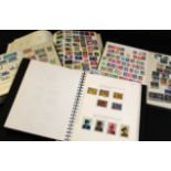 Box of various stamp albums including stamps from Canada, Royal Historical Series, an album with