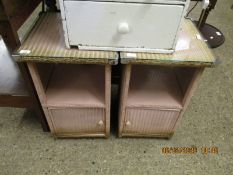 PAIR OF LLOYD LOOM TYPE PINK WICKER BEDSIDE CUPBOARDS WITH OPEN SHELF AND SINGLE CUPBOARD DOOR