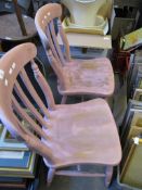 TWO PUCE PAINTED HARD SEATED KITCHEN CHAIRS