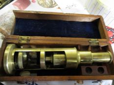 MAHOGANY CASED PART BRASS MICROSCOPE