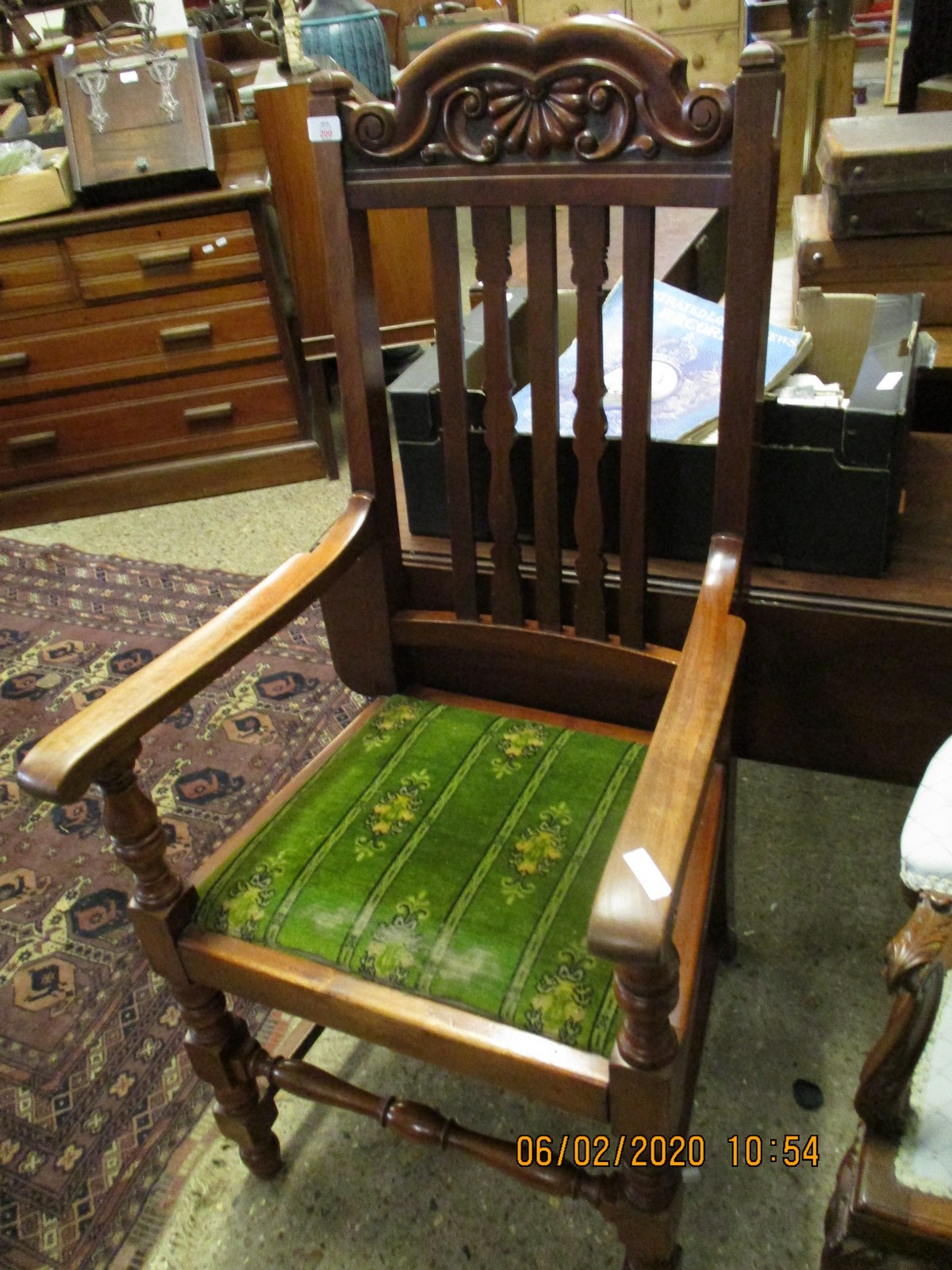 MAHOGANY FRAMED ARMCHAIR WITH CARVED BACK RAIL WITH GREEN DROP IN SEAT