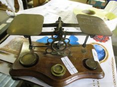 BRASS AND MAHOGANY SET OF POSTAL SCALES AND WEIGHTS