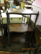 19TH CENTURY WALNUT SERPENTINE THREE TIER WHATNOT ON BARLEY TWIST SUPPORTS