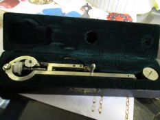 CALIBRATION TOOL MANUFACTURED BY STANLEY, NO 68717, IN GREEN VELVET LINED BOX