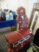 MODEL OF A GIPSY CARAVAN AND A RESIN MODEL OF AN INDIAN