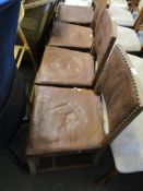 SET OF FOUR OAK FRAMED BROWN LEATHER UPHOLSTERED DINING CHAIRS