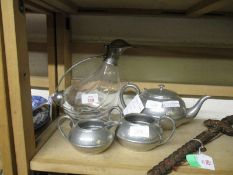 PEWTER AND GLASS CARAFE, AN ENGLISH PEWTER THREE PIECE TEA SET