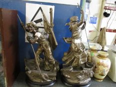 TWO SPELTER MODELS OF A SAILOR AND HIS WIFE ON EBONISED SOCLES