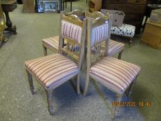 SET OF FOUR OAK FRAMED STRIPED UPHOLSTERED SEAT AND BACK DINING CHAIRS ON TURNED FRONT LEGS