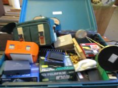 GREEN PLASTIC SUITCASE CONTAINING BUCKLES, CAMERA, WALLETS ETC