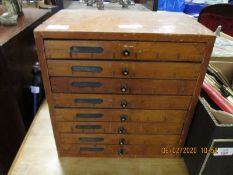 MAHOGANY FRAMED TABLE TOP CHEST WITH EIGHT DRAWERS WITH QUANTITY OF NUTS, SCREWS, NAILS ETC