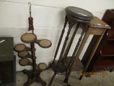 OAK FRAMED CIRCULAR TWO-TIER PLANT STAND WITH TWISTED COLUMN SUPPORTS TOGETHER WITH A FURTHER SQUARE