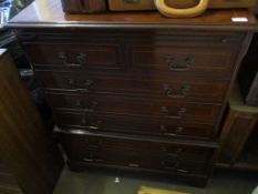 REPRODUCTION MAHOGANY MUSIC CABINET FORMED AS A FOUR FAUX DRAWER CHEST