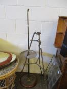 VICTORIAN BRASS STAND AND A FURTHER VICTORIAN 16-GLASS SPARK GUARD AND BRASS LAMP WITH CIRCULAR