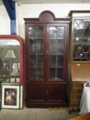 EDWARDIAN MAHOGANY BOOKCASE WITH TWO LEADED AND GLAZED DOORS OVER TWO PANELLED CUPBOARD DOORS WITH