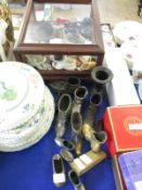 TABLE TOP DISPLAY BOX CONTAINING PORCELAIN SHOES, METAL SHOES ETC