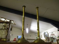 PAIR OF BRASS EJECTOR CANDLESTICKS OF LARGE PROPORTIONS