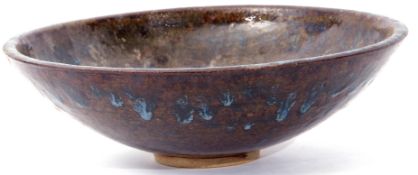 Large Studio Pottery bowl with a mottled brown design, 38cm diam