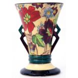 Flared vase with floral design and angular handles, the base stamped "British Roskyl Pottery" and