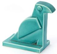 Belgian Nimy Art Deco Pottery model of a bird in stylised form in green crackle glaze, standing on a